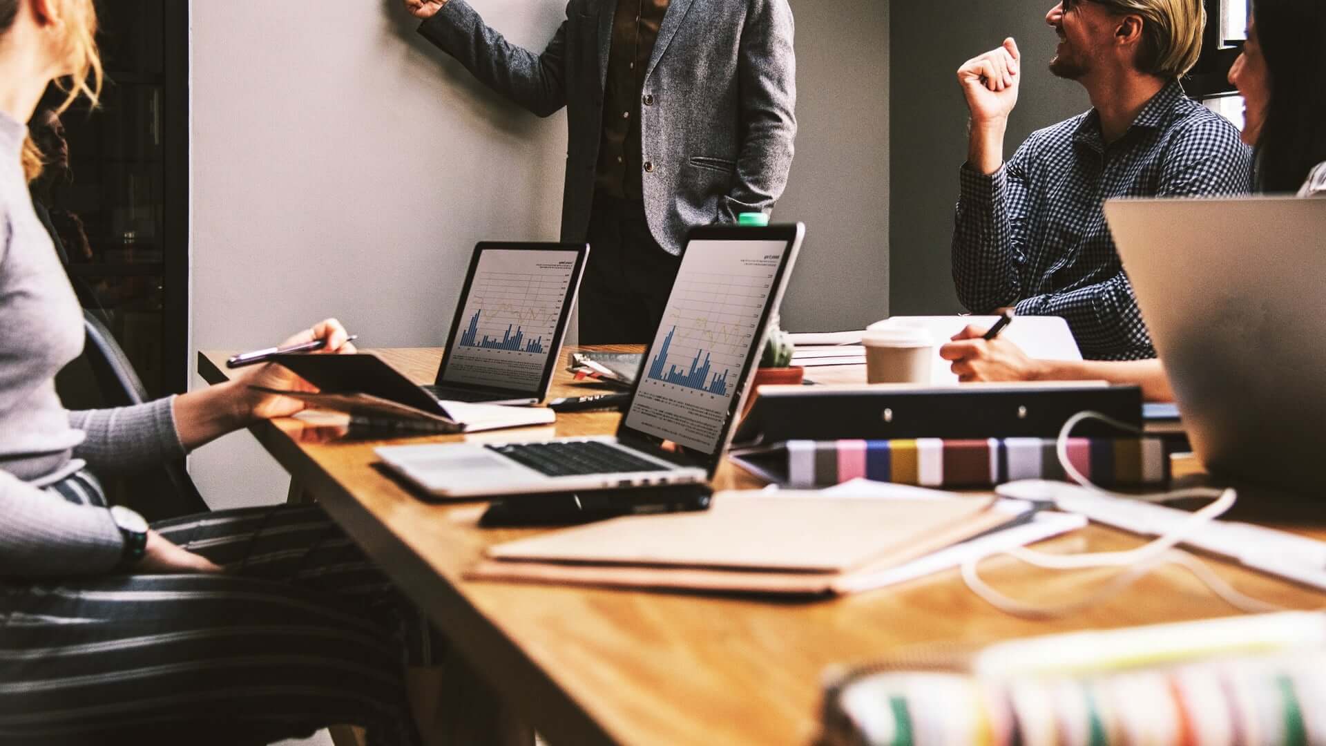 a group of people in a meeting